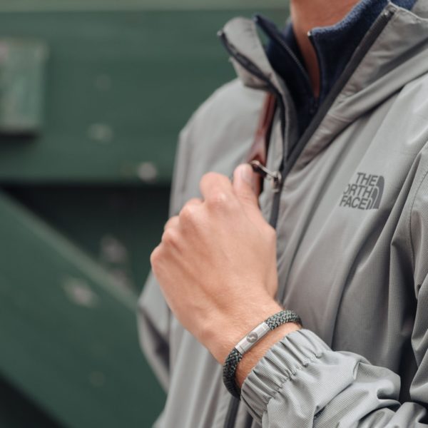 Outdoor man wearing green bracelet