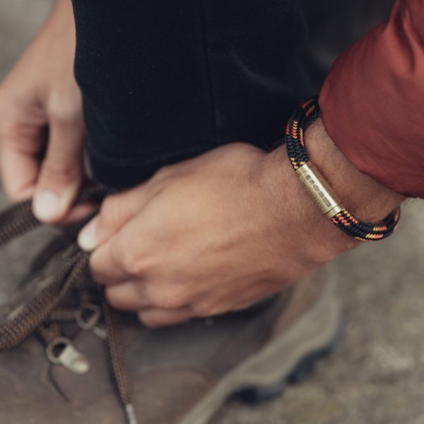 Man wearing black bracelet Uluru