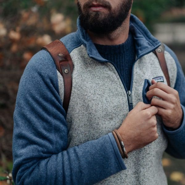 Man wearing brown skinny paradors bracelet