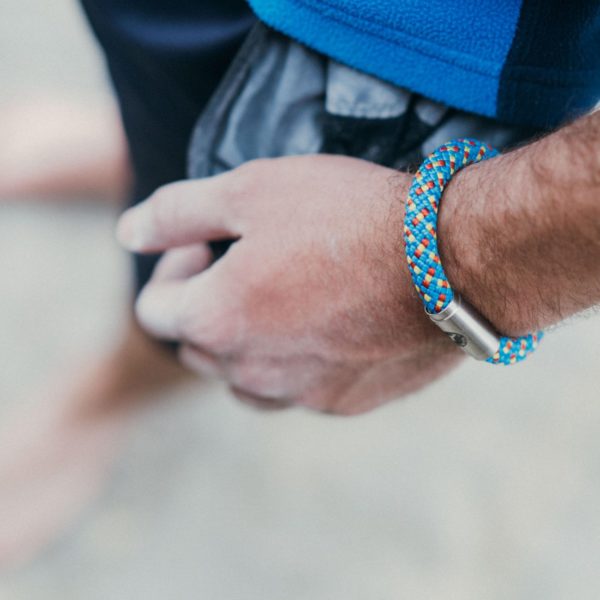 Man wearing multicolour rope bracelet