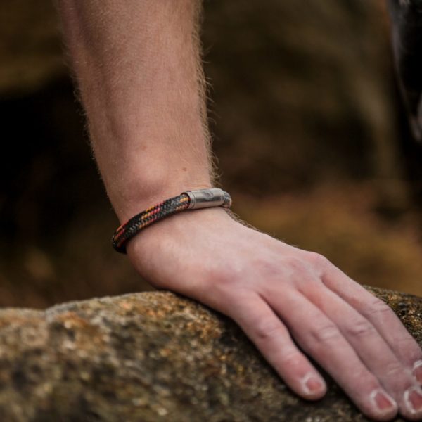 Man wearing black bracelet Uluru